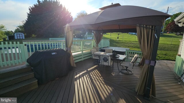1300 River Rd, Holtwood, PA 17532 - wooden deck with a gazebo, outdoor dining space, and a yard
