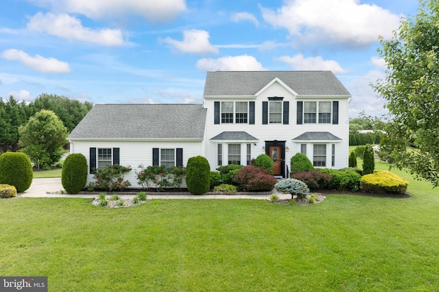 1219 N Valley Ave, Vineland, NJ 08360 - colonial house featuring a front yard and roof with shingles