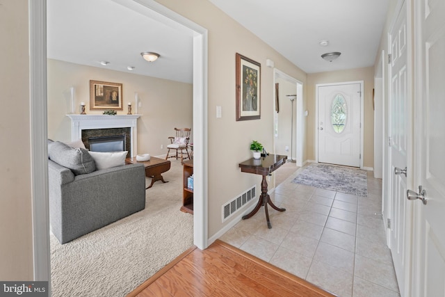 1219 N Valley Ave, Vineland, NJ 08360 - foyer featuring a fireplace and baseboards