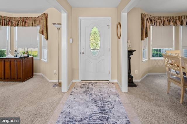 1219 N Valley Ave, Vineland, NJ 08360 - entryway featuring healthy amount of natural light, light colored carpet, baseboards, and light tile patterned floors
