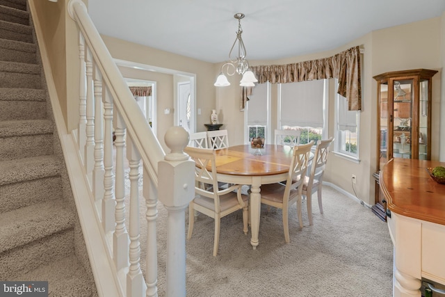 1219 N Valley Ave, Vineland, NJ 08360 - dining area featuring stairway, light carpet, and baseboards