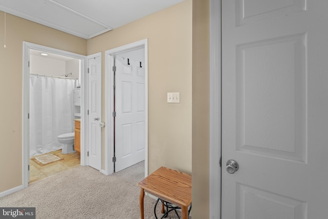 1219 N Valley Ave, Vineland, NJ 08360 - hallway with attic access, light carpet, and baseboards