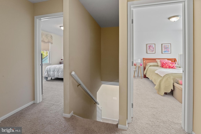 1219 N Valley Ave, Vineland, NJ 08360 - hall with an upstairs landing, carpet flooring, and baseboards