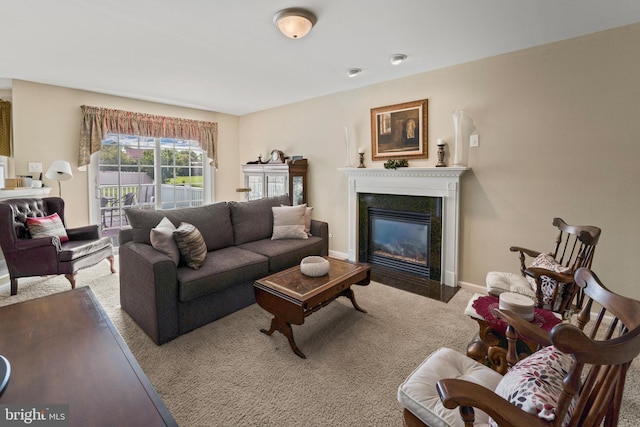 1219 N Valley Ave, Vineland, NJ 08360 - living area with carpet flooring, a glass covered fireplace, and baseboards