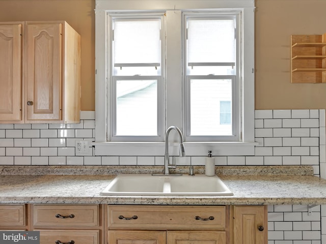 135 Hoover St, Schuylkill Haven, PA 17972 - kitchen with light brown cabinets, a sink, decorative backsplash, and light countertops
