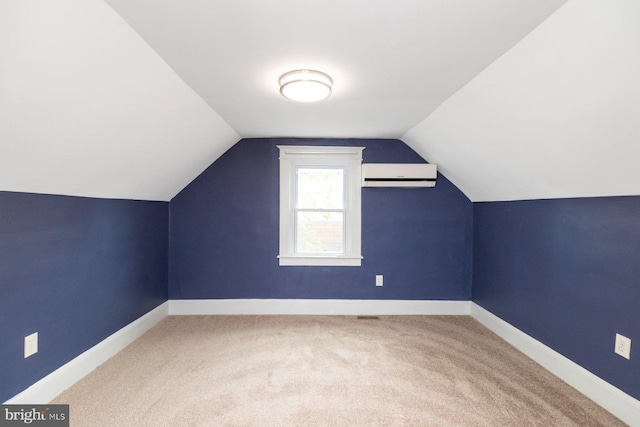 3327 Richmond Ave, Baltimore, MD 21213 - additional living space with carpet flooring, a wall mounted air conditioner, vaulted ceiling, and baseboards