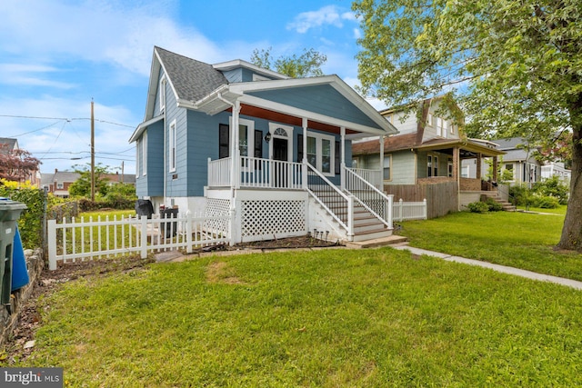 3327 Richmond Ave, Baltimore, MD 21213 - bungalow featuring covered porch, roof with shingles, and stairs