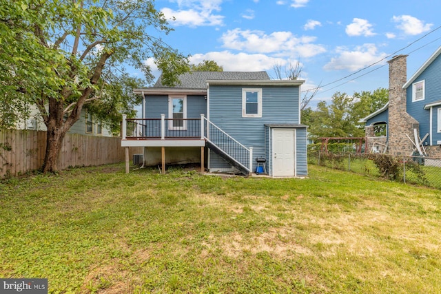 3327 Richmond Ave, Baltimore, MD 21213 - back of property with a deck, stairs, and a shingled roof