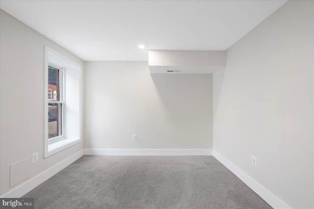724 E 21st St, Baltimore, MD 21218 - unfurnished room featuring carpet, baseboards, and recessed lighting