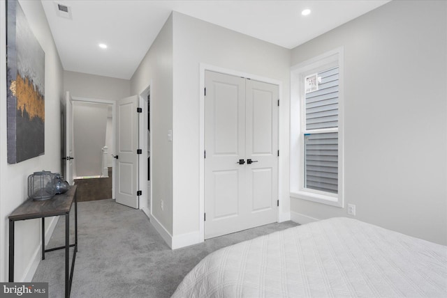 724 E 21st St, Baltimore, MD 21218 - bedroom with carpet flooring, baseboards, recessed lighting, and a closet