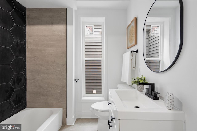 724 E 21st St, Baltimore, MD 21218 - full bath with vanity, toilet, and baseboards