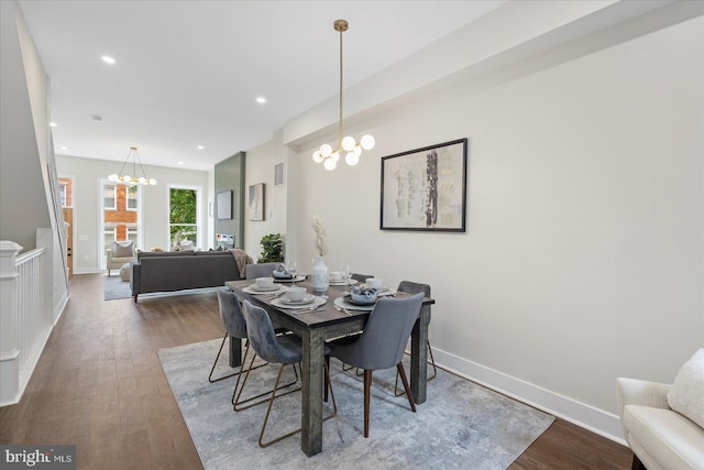 724 E 21st St, Baltimore, MD 21218 - dining room featuring a chandelier, dark wood finished floors, baseboards, and recessed lighting