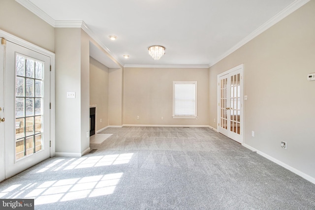 8524 Schultz Rd, Clinton, MD 20735 - unfurnished room featuring healthy amount of natural light, light carpet, a fireplace, and ornamental molding