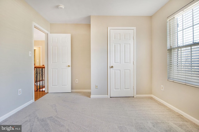 8524 Schultz Rd, Clinton, MD 20735 - unfurnished bedroom featuring carpet flooring and baseboards