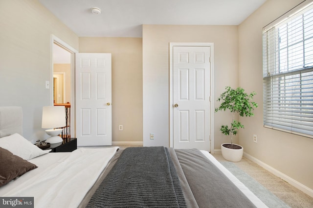 8524 Schultz Rd, Clinton, MD 20735 - bedroom with baseboards and carpet