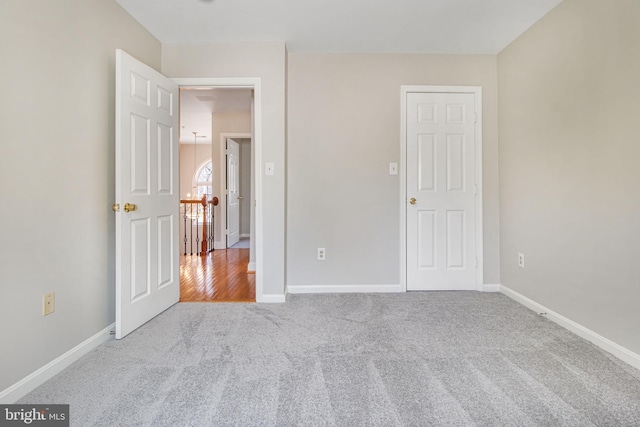 8524 Schultz Rd, Clinton, MD 20735 - unfurnished bedroom featuring carpet floors and baseboards