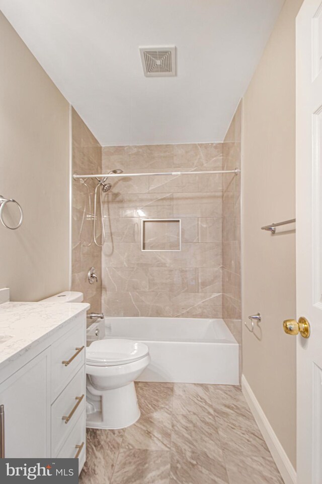 8524 Schultz Rd, Clinton, MD 20735 - bathroom with vanity, shower / bathtub combination, toilet, and baseboards