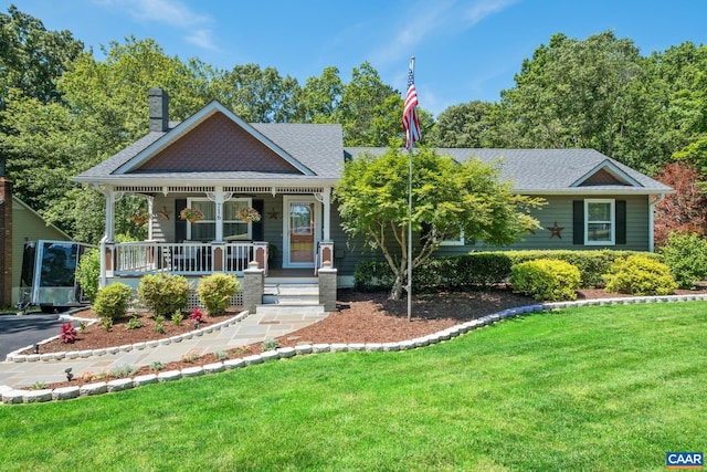 716 Preddy Creek Rd, Barboursville, VA 22923 - victorian-style house with a porch, a front lawn, a chimney, and roof with shingles