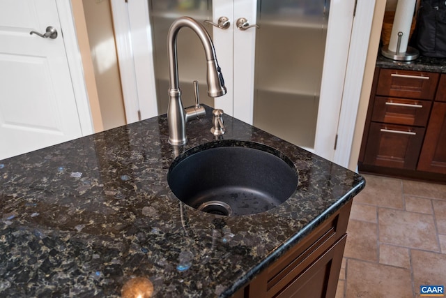 716 Preddy Creek Rd, Barboursville, VA 22923 - kitchen view of a sink and dark stone countertops