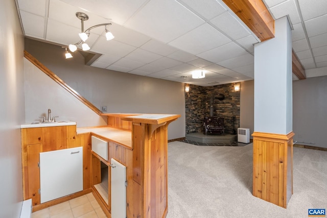 716 Preddy Creek Rd, Barboursville, VA 22923 - indoor wet bar with a drop ceiling, a wood stove, and carpet
