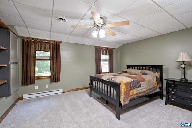 716 Preddy Creek Rd, Barboursville, VA 22923 - carpeted bedroom with a baseboard heating unit, a drop ceiling, baseboards, and a ceiling fan