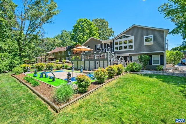 716 Preddy Creek Rd, Barboursville, VA 22923 - rear view of house featuring a wooden deck, stairway, and a lawn