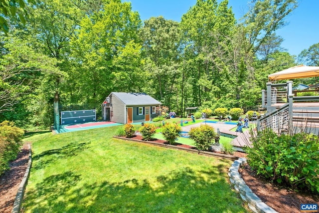 716 Preddy Creek Rd, Barboursville, VA 22923 - view of grassy yard featuring an outbuilding and basketball court