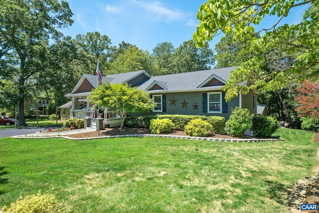 716 Preddy Creek Rd, Barboursville, VA 22923 - view of front facade featuring a front yard, roof with shingles, and covered porch
