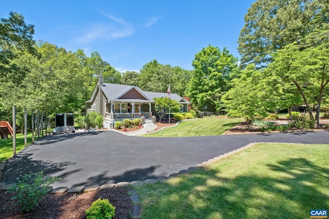 716 Preddy Creek Rd, Barboursville, VA 22923 - view of front facade with covered porch, a front yard, and asphalt driveway