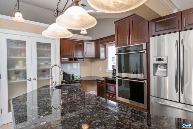 716 Preddy Creek Rd, Barboursville, VA 22923 - kitchen with appliances with stainless steel finishes, a sink, dark stone counters, and pendant lighting