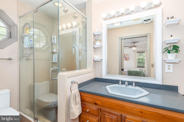 3532 Tall Pines Ln, Snow Hill, MD 21863 - full bath featuring toilet, ensuite bathroom, a shower stall, vanity, and a ceiling fan