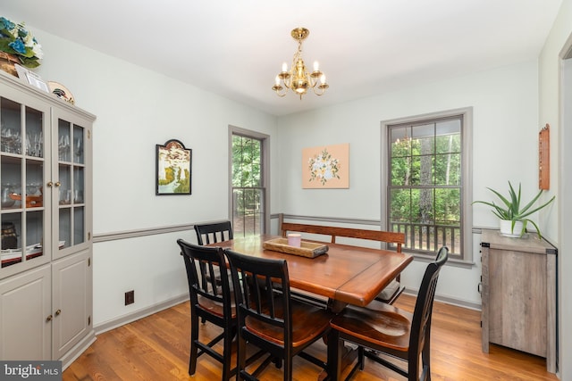 3532 Tall Pines Ln, Snow Hill, MD 21863 - dining space with a chandelier, plenty of natural light, light wood-style floors, and baseboards