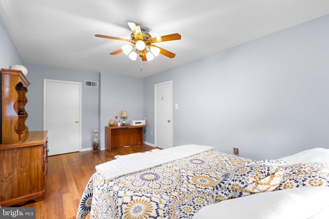 1704 Horner Rd, Woodbridge, VA 22191 - bedroom with wood finished floors, baseboards, and ceiling fan