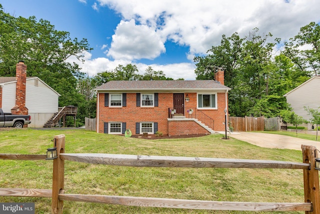 1704 Horner Rd, Woodbridge, VA 22191 - view of front of property with brick siding, stairway, and a chimney