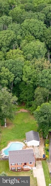 1704 Horner Rd, Woodbridge, VA 22191 - aerial view of a heavily wooded area and a pool area