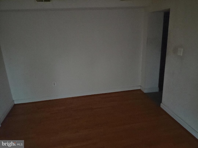 4202 Grant St NE Unit 202, Washington, DC 20019 - unfurnished room with wood finished floors and baseboards
