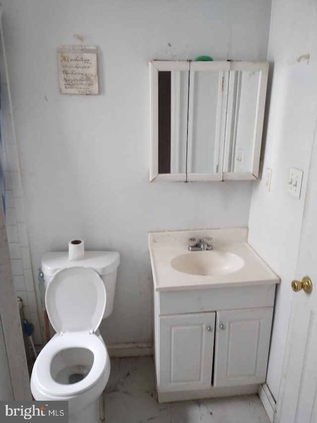 4202 Grant St NE Unit 202, Washington, DC 20019 - full bath with vanity, toilet, and marble look tiles