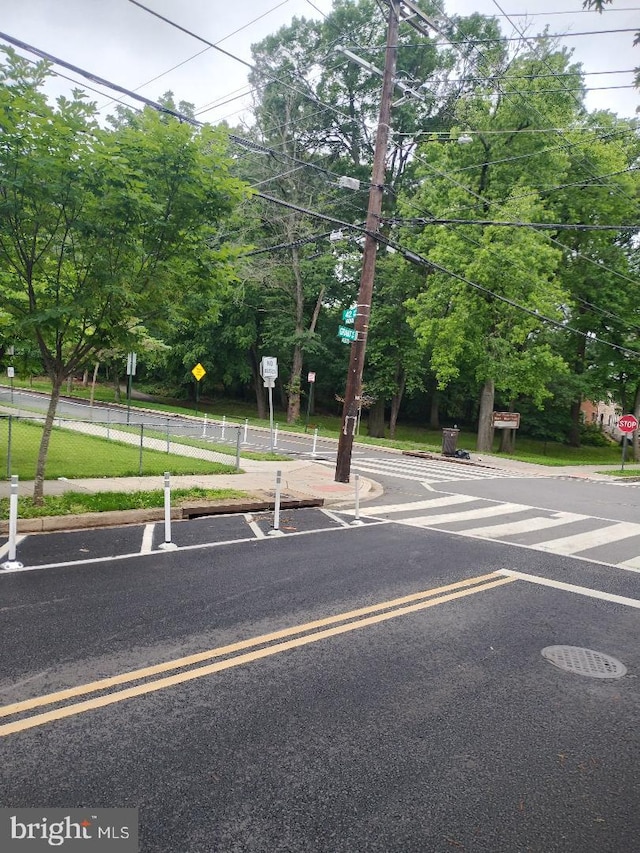 4202 Grant St NE Unit 202, Washington, DC 20019 - view of car parking with view of scattered trees