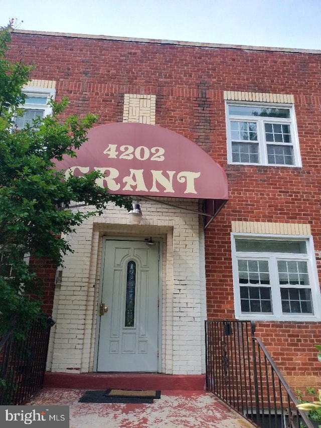 4202 Grant St NE Unit 202, Washington, DC 20019 - property entrance with brick siding