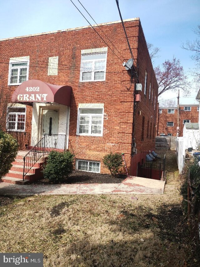 4202 Grant St NE Unit 202, Washington, DC 20019 - view of front of house featuring brick siding