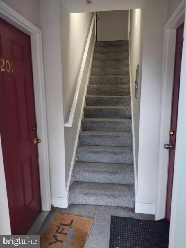 4202 Grant St NE Unit 202, Washington, DC 20019 - staircase with baseboards