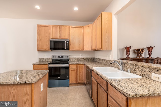 1908 Golden Morning Dr Unit 38, Bowie, MD 20721 - kitchen with stainless steel appliances, a sink, light stone countertops, recessed lighting, and a peninsula