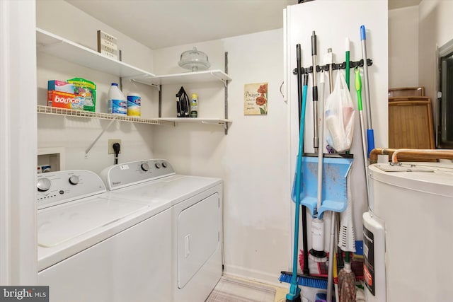 649 Brandon Rd, Eagleville, PA 19403 - washroom featuring washing machine and dryer, baseboards, and water heater