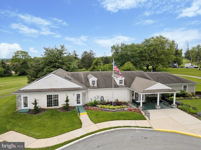 649 Brandon Rd, Eagleville, PA 19403 - view of front facade with a carport, a front yard, and concrete driveway