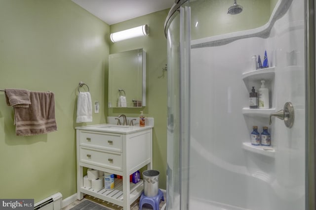 333 S School Ln, Smyrna, DE 19977 - full bath featuring a shower stall, a baseboard heating unit, and vanity