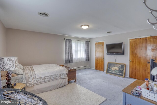 333 S School Ln, Smyrna, DE 19977 - carpeted bedroom featuring a baseboard heating unit and baseboards