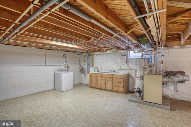 333 S School Ln, Smyrna, DE 19977 - below grade area with washer / dryer, light floors, and a sink