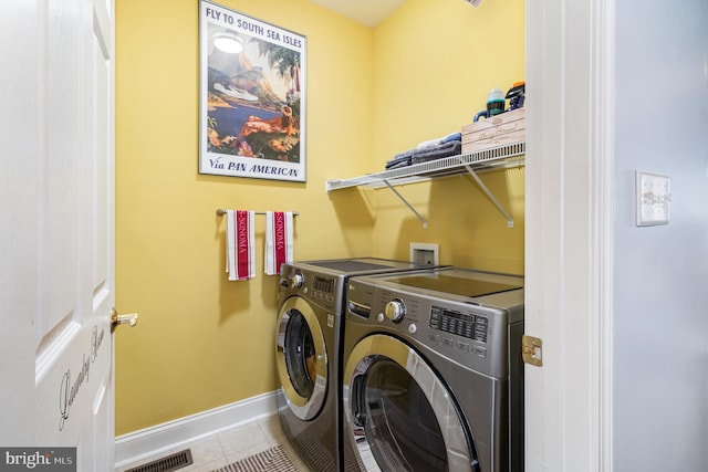 1430 Amherst Ct, Mechanicsburg, PA 17050 - laundry area featuring washing machine and dryer, baseboards, and tile patterned floors