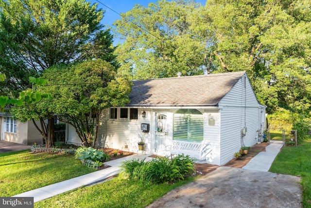 9615 51st Pl, College Park, MD 20740 - view of front of house featuring a gate, roof with shingles, and covered porch