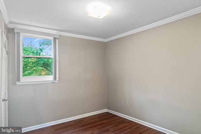 9615 51st Pl, College Park, MD 20740 - empty room with dark wood finished floors, baseboards, and crown molding
